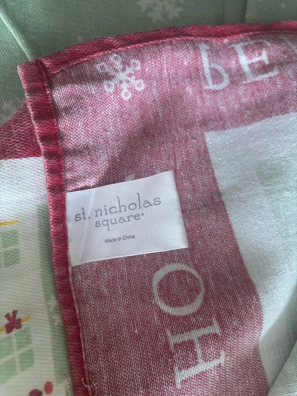 St. Nicholas Square Holiday Village Table cloth in Red, Green, White
